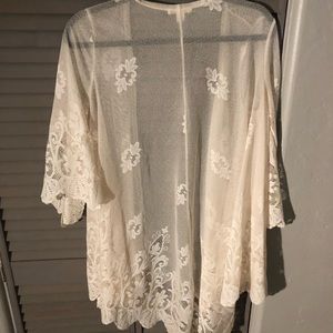 A white lace beach cover up